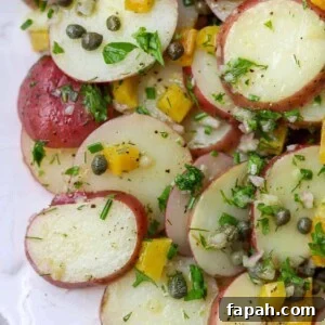 Close up of Herbed Potato Salad with Capers and Pickled Golden Beets.