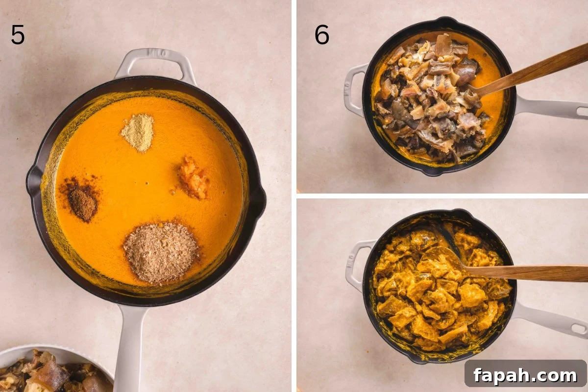 Adding the seasoning and meat into the palm oil soup base.
