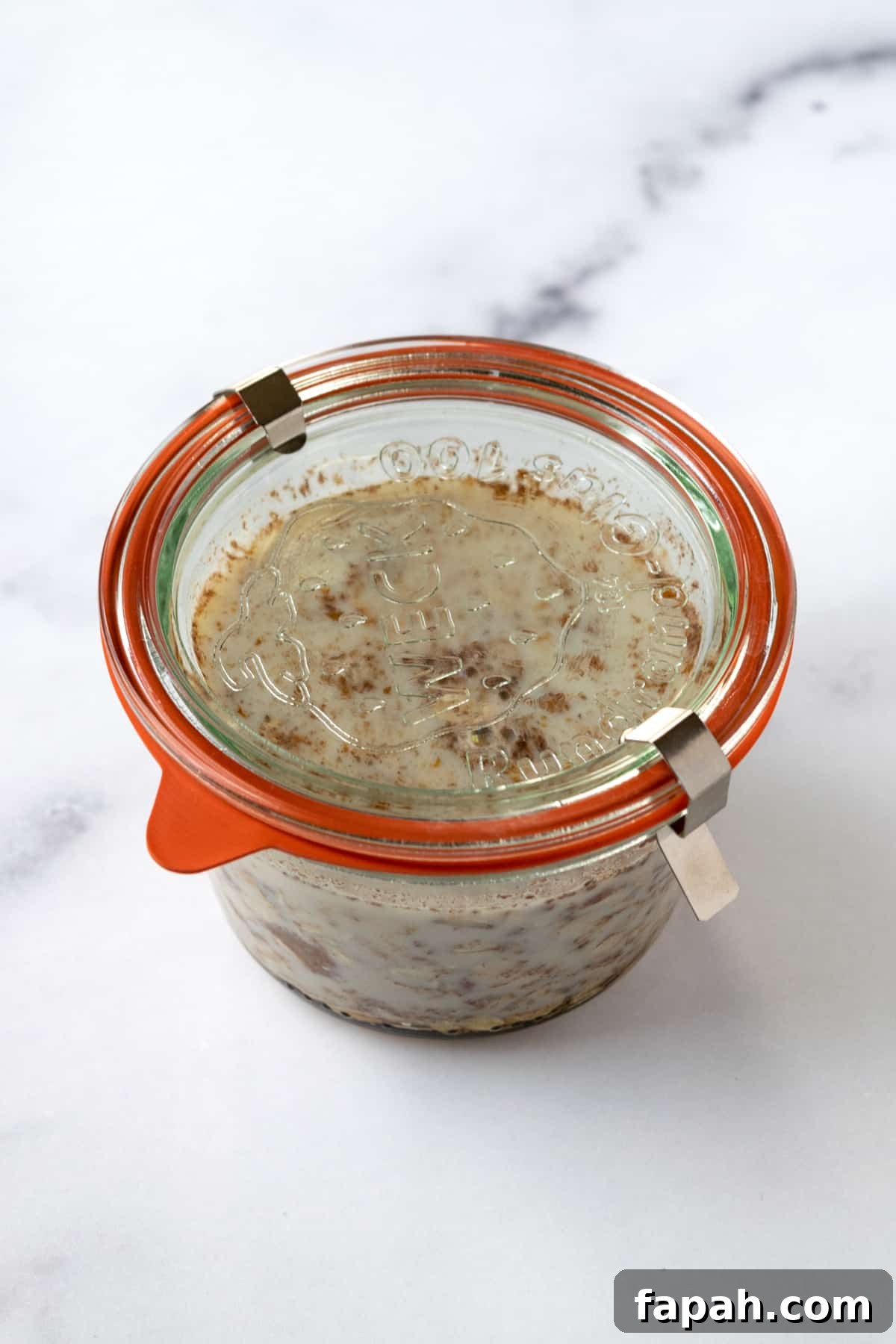 Cookie Dough Overnight Oats in a glass jar.