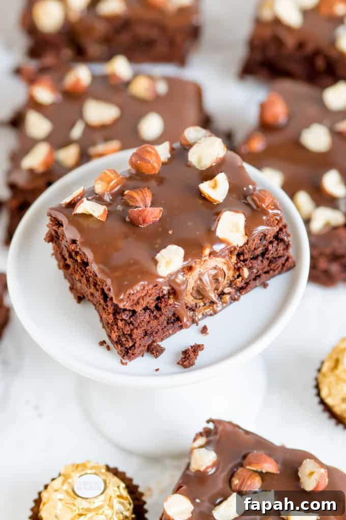 Decadent Ferrero Rocher Brownies with Milk Chocolate Ganache 2 These Ferrero Rocher Brownies are the ultimate treat to go with your afternoon cup of coffee!