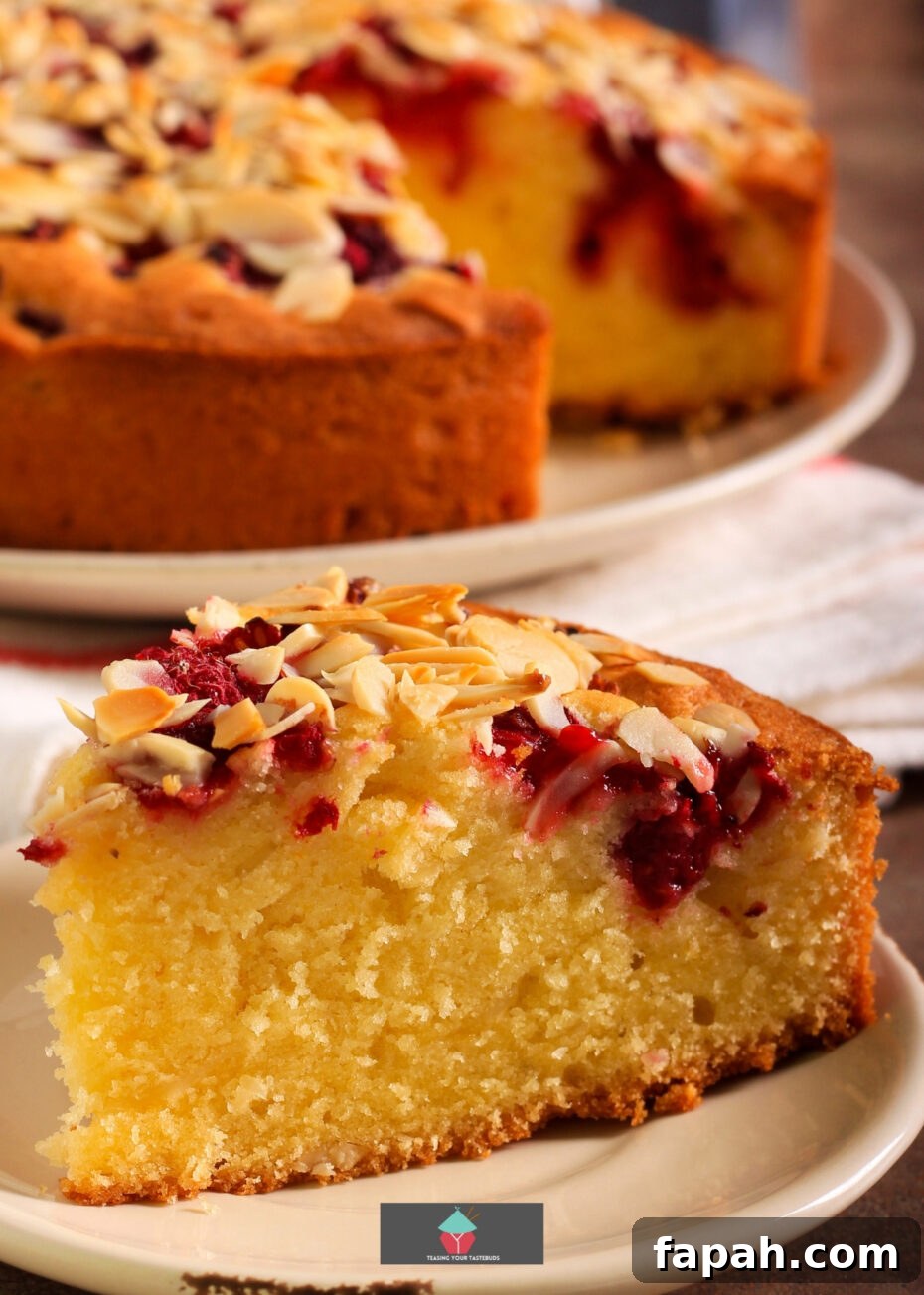 Raspberry and Almond Cake. This Raspberry and Almond Cake is an easy recipe with soft almond sponge with a scattering of fresh raspberries throughout and topped with toasted almonds. A delicious afternoon tea treat.