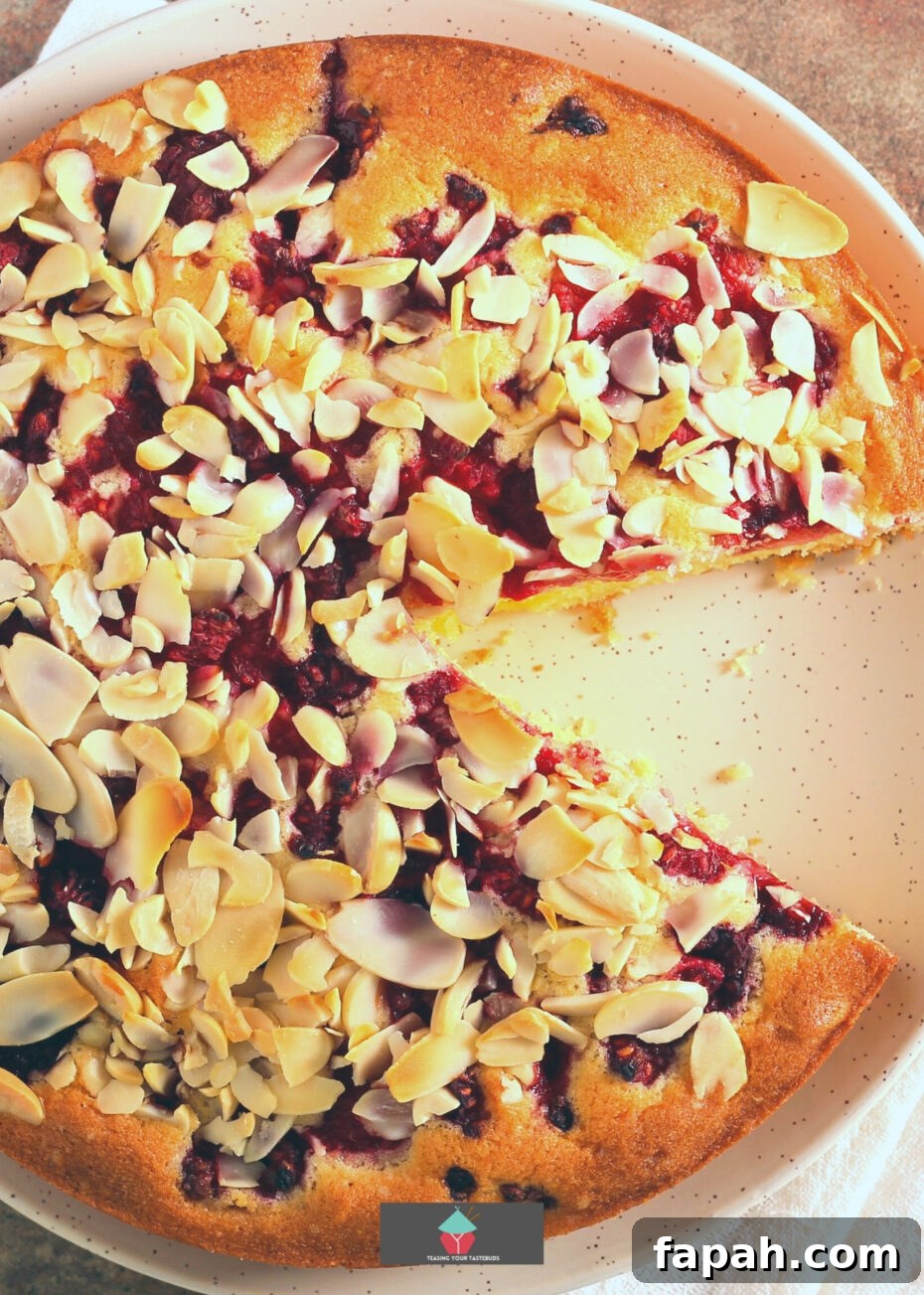 Raspberry and Almond Cake. This Raspberry and Almond Cake is an easy recipe with soft almond sponge with a scattering of fresh raspberries throughout and topped with toasted almonds. A delicious afternoon tea treat.