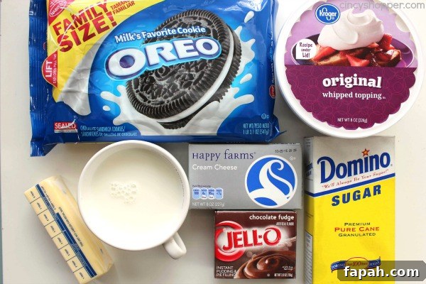 Chocolate Lush Bars - Perfect No Bake dessert. Oreo cookie crust tastes amazing with the cream cheese and chocolate pudding layer.