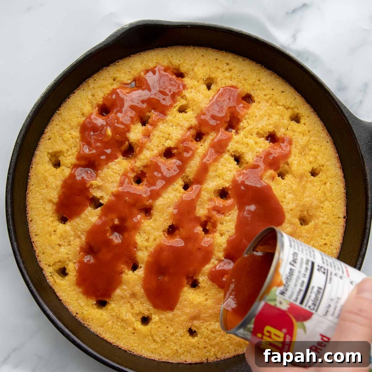 enchilada sauce poured over the baked cornbread.