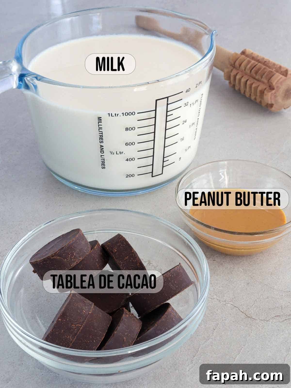 peanut butter, tablea and milk in bowls.