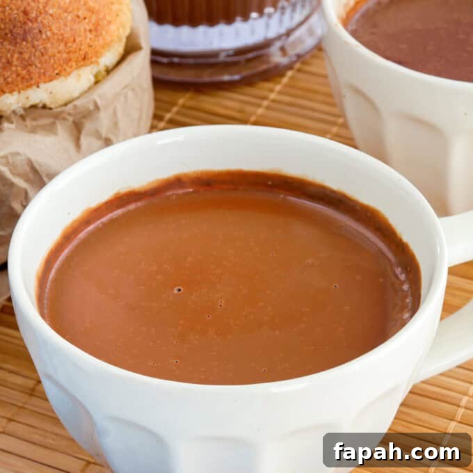 hot chocolate in a white cup.