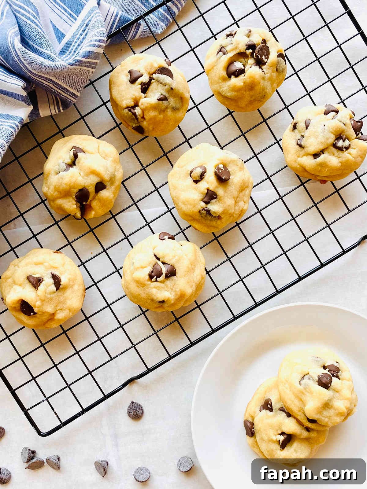Chocolate Chip Cookies Made Without Brown Sugar: Soft & Crispy Recipe 3 easy chocolate chip cookies without brown sugar cooling on a rack next to chocolate chips