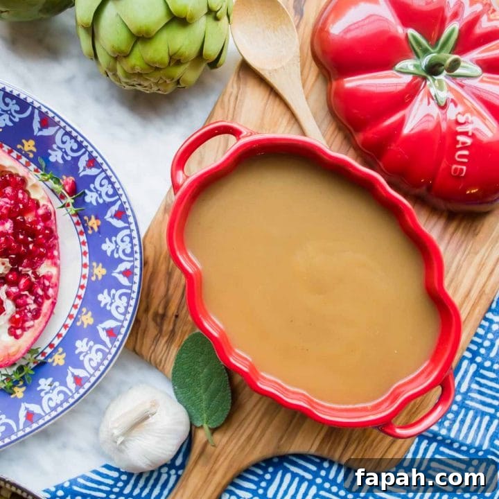 Turkey Au Jus Gravy with other sides flatlay.