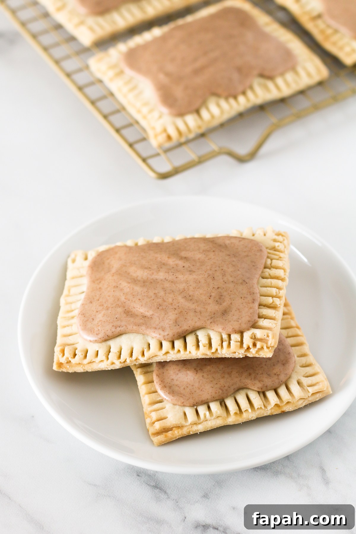 Gluten Free Vegan Brown Sugar Cinnamon Pop Tarts. Buttery pastry, with a cinnamon sugar filling and covered in a sweet cinnamon glaze. 