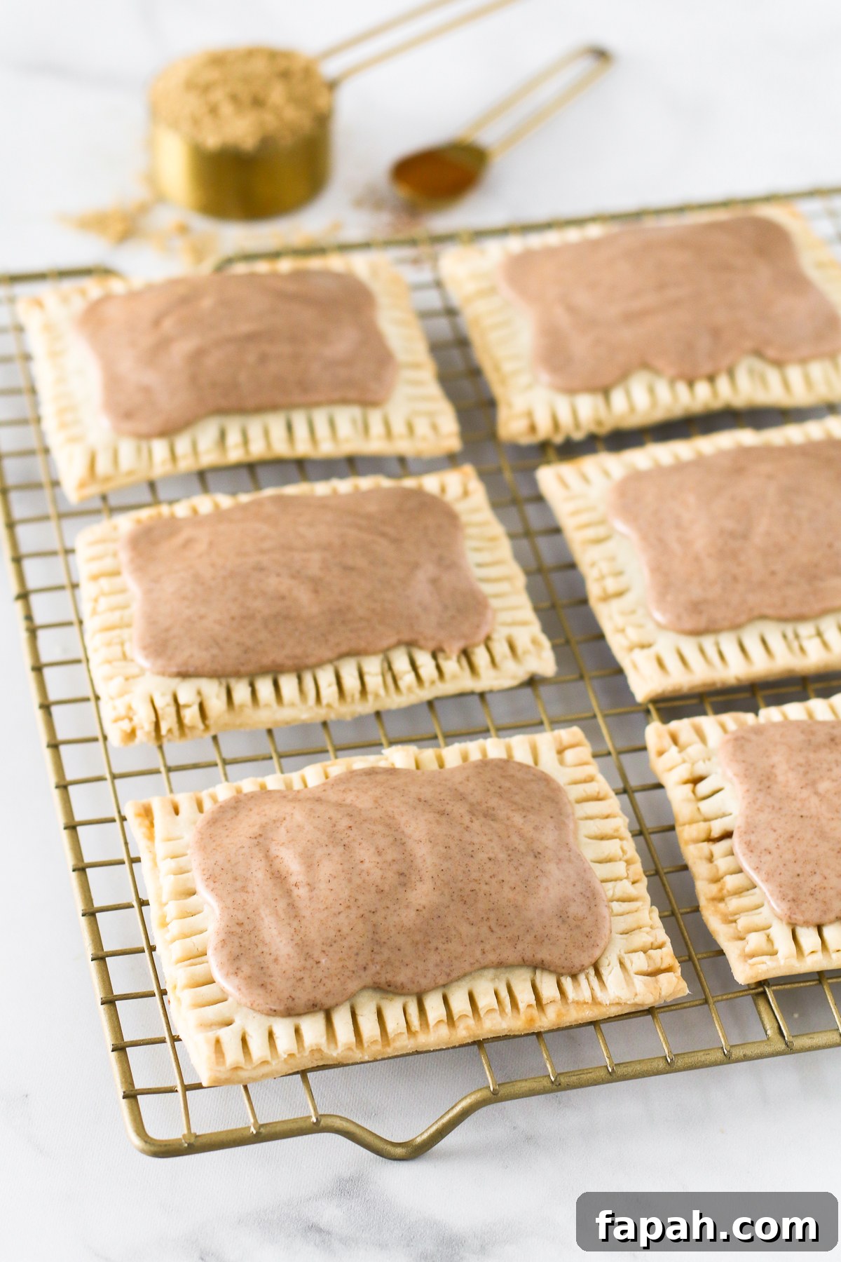 Gluten Free Vegan Brown Sugar Cinnamon Pop Tarts. Homemade buttery pastry, with a cinnamon sugar filling and covered in a sweet cinnamon glaze. 