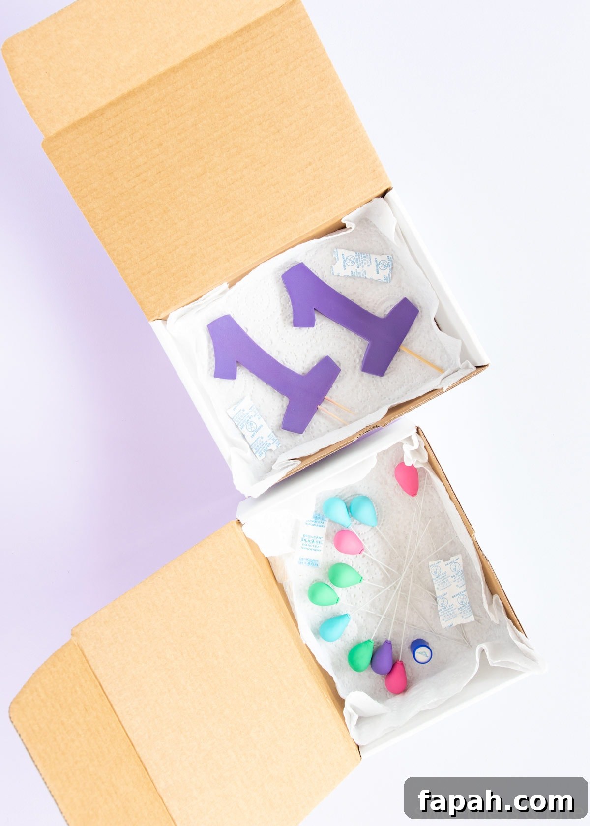 Storing Fondant Decorations: Tips to Keep Cakes Flawless 5 Gumpaste and fondant cake decorations stored in a box.