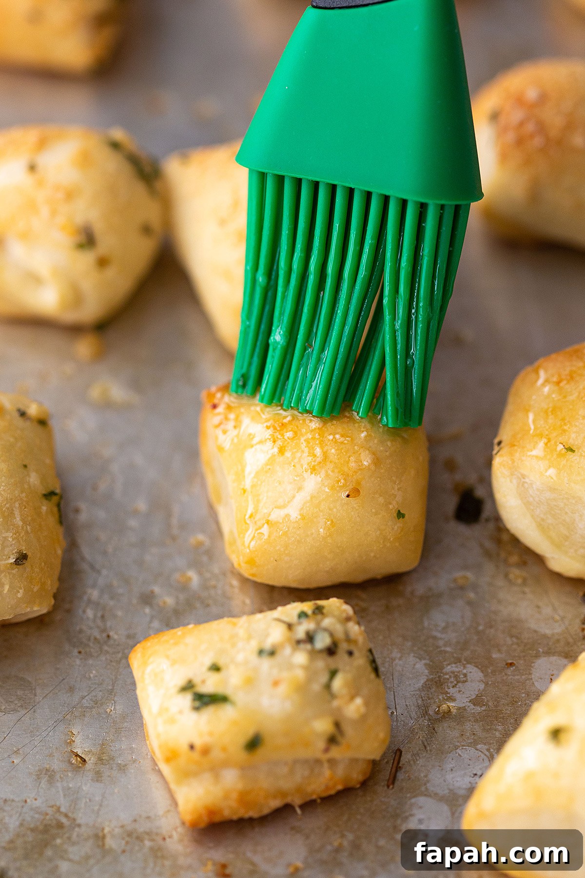 Brushing Garlic Butter on Bread Bites