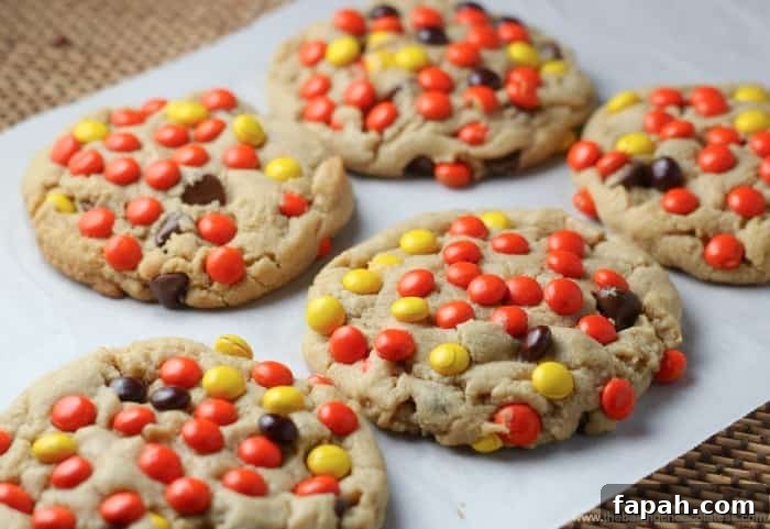 Reese's Pieces Peanut Butter Blast Cookies on parchment