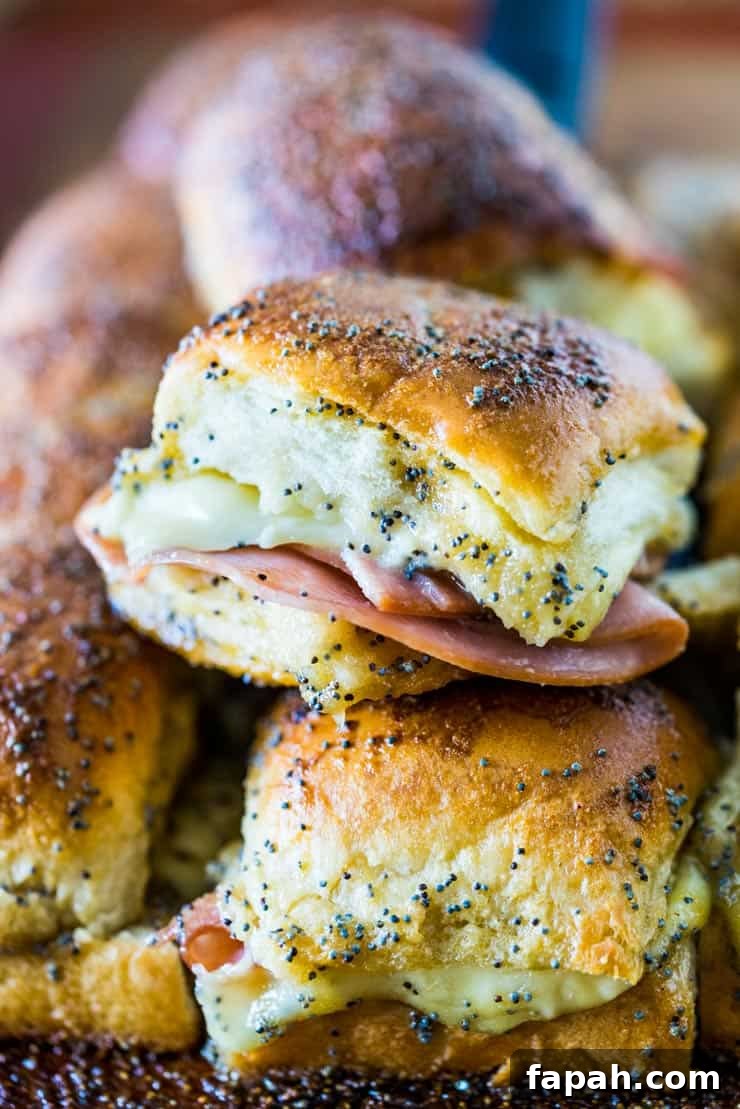 Sweet Ham & Swiss Sliders with Tangy Glaze Recipe 2 Sweet Ham and Swiss Sliders are a perfect party food and can be baked whenever you're ready to eat, so they're always hot and melty for your guests!