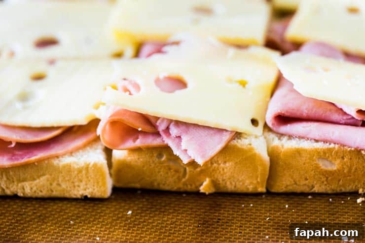 Sweet Ham & Swiss Sliders with Tangy Glaze Recipe 3 Sweet Ham and Swiss Sliders are a perfect party food and can be baked whenever you're ready to eat, so they're always hot and melty for your guests!
