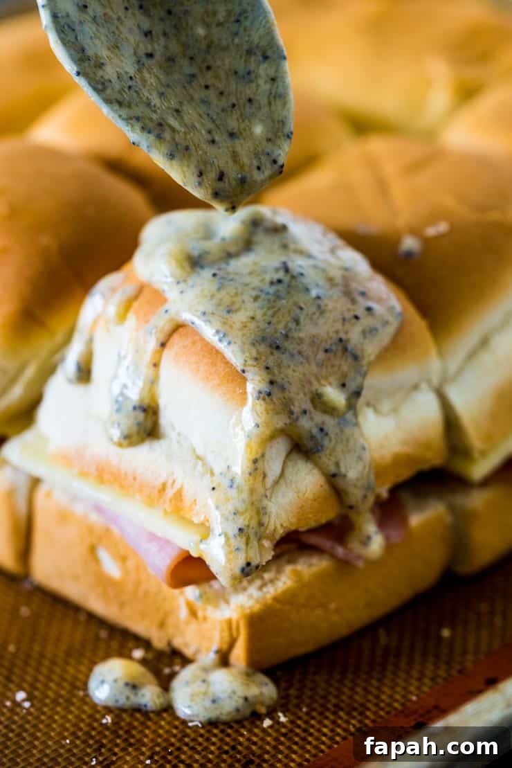 Sweet Ham & Swiss Sliders with Tangy Glaze Recipe 4 Sweet Ham and Swiss Sliders are a perfect party food and can be baked whenever you're ready to eat, so they're always hot and melty for your guests!