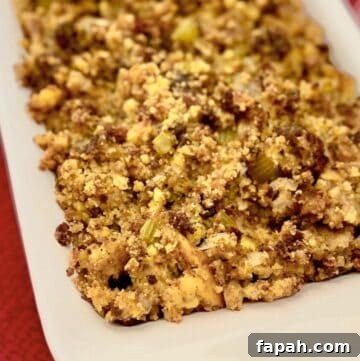 Southern Cornbread Dressing in white casserole dish.