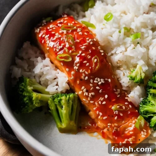 Sweet Chili Salmon Recipe Guaranteed to Impress 5 Sweet chili salmon fillet baked until tender, glazed with sticky sweet chili sauce, and garnished with sesame seeds and green onions.