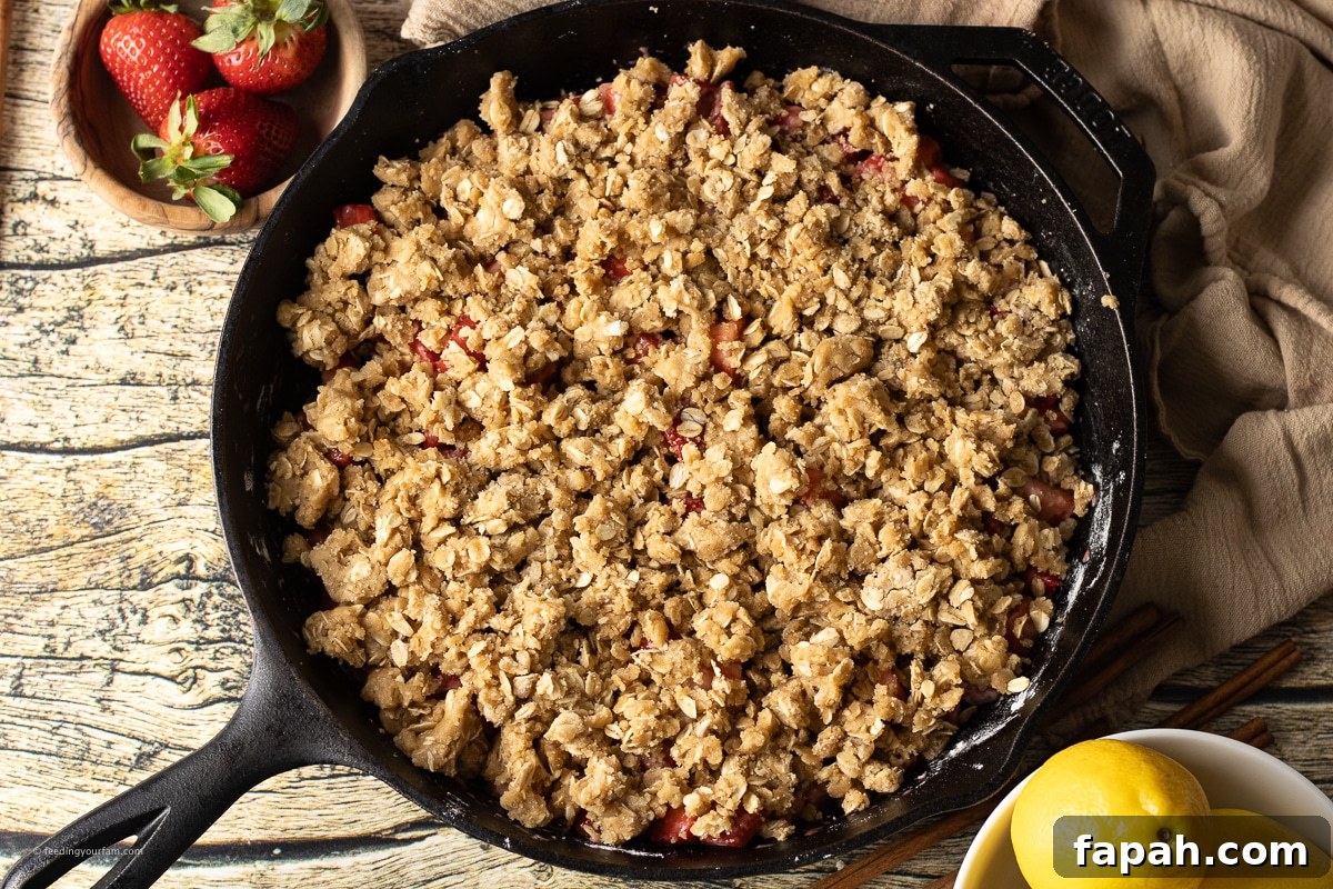 strawberry crisp in a cast iron skillet