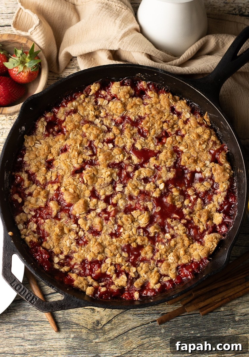 strawberry crumble in a cast iron skillet 