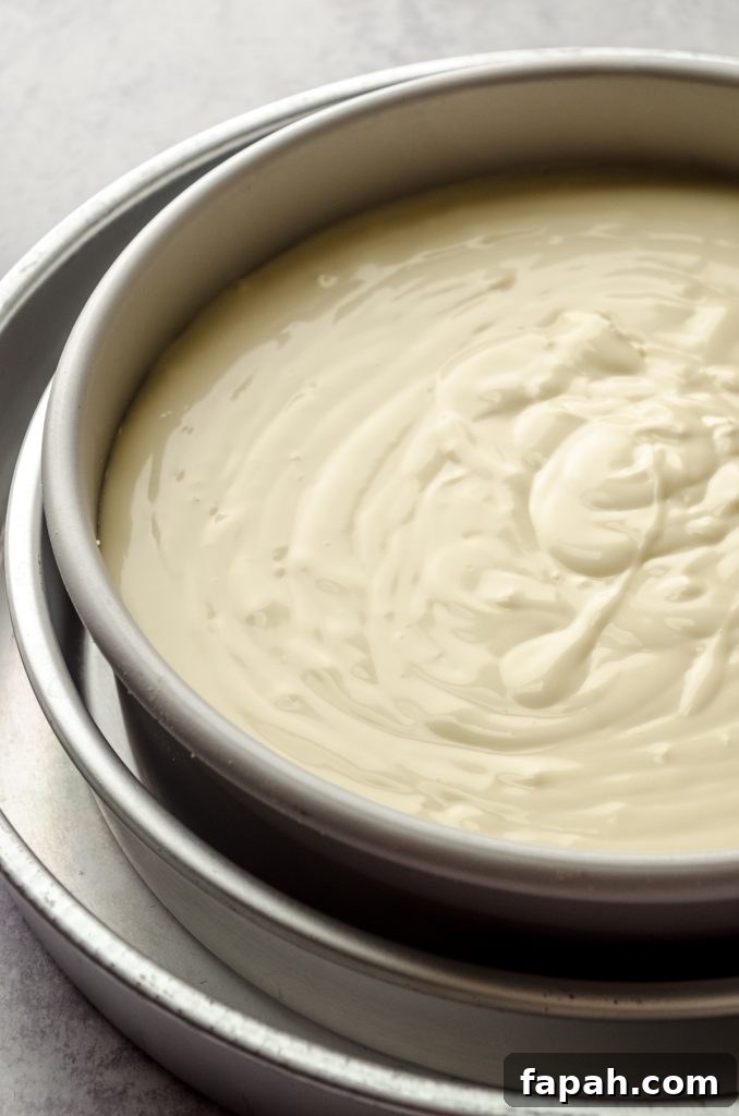 Goat Cheese Cheesecake with Roasted Honey Walnut Topping 9 Goat cheese cheesecake in a pan ready to bake.
