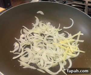Onions and ginger in pan