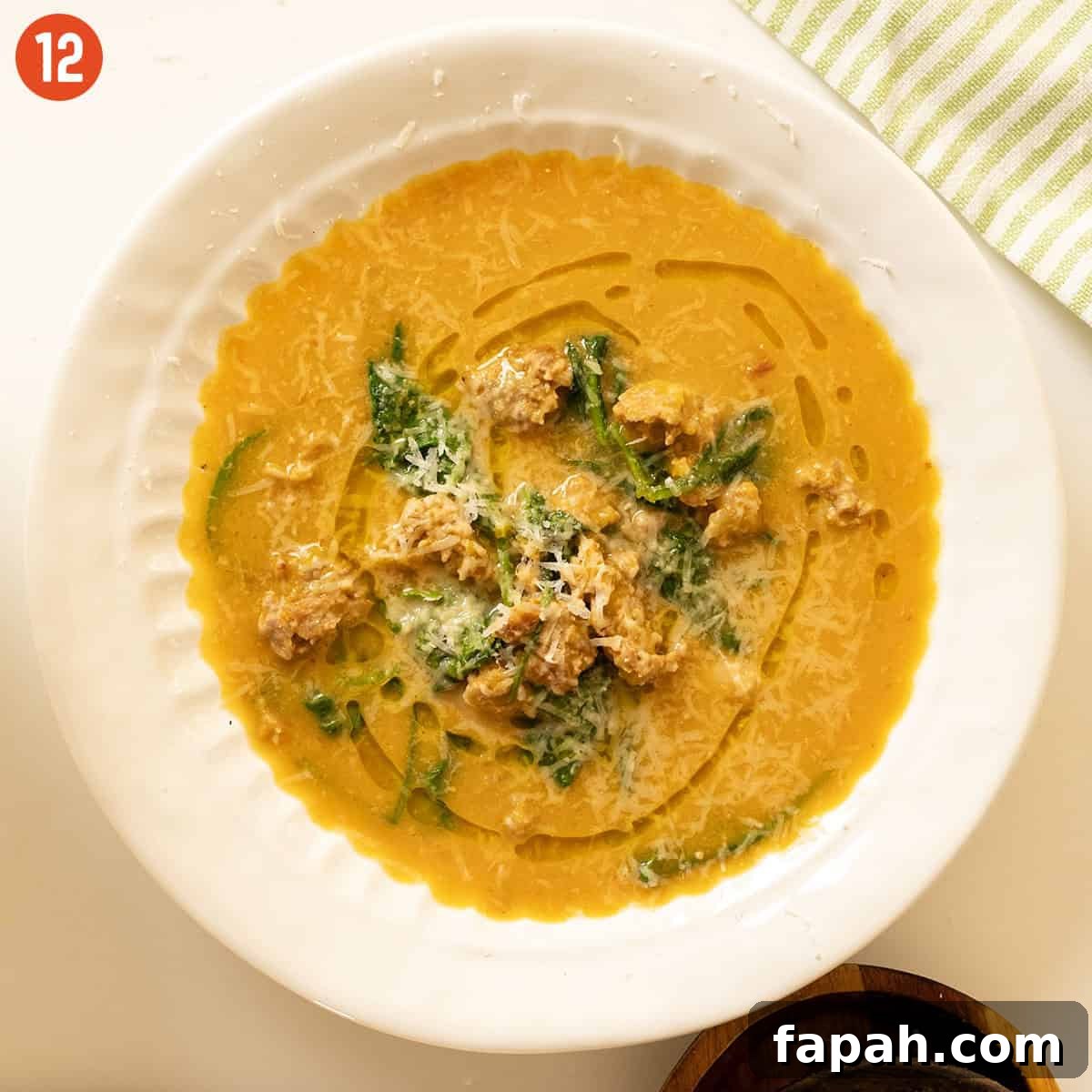 Creamy Butternut Squash and Sausage Soup Recipe 11 Bowl of butternut squash soup.