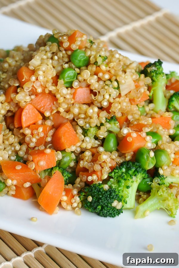 Vegetarian Quinoa Fried Rice with Broccoli, Peas, and Carrots
