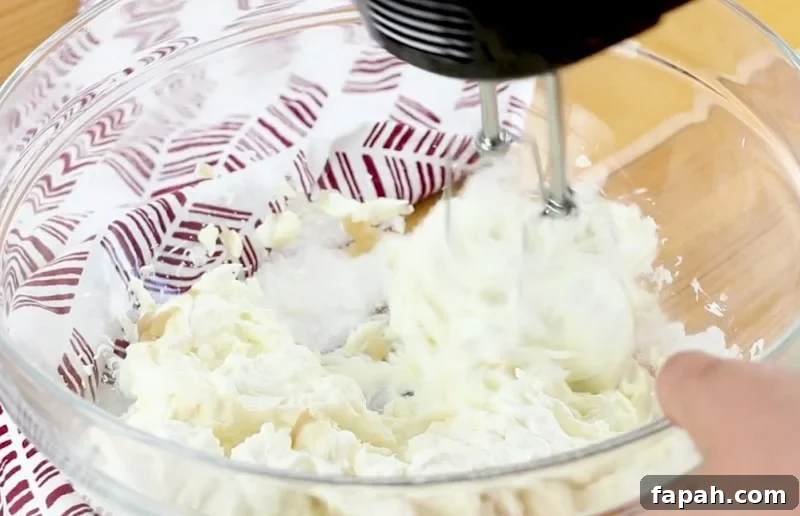 Cream cheese mixture being mixed.
