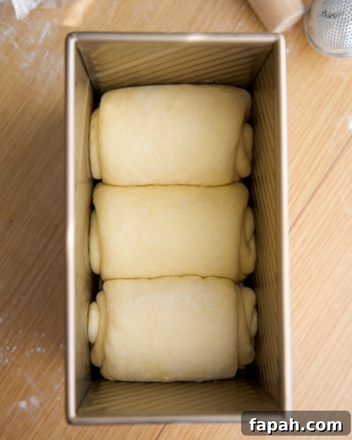 three rolled up pieces of dough