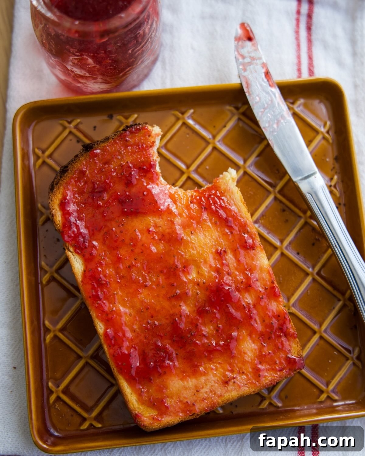 strawberry jam on toasted milk bread