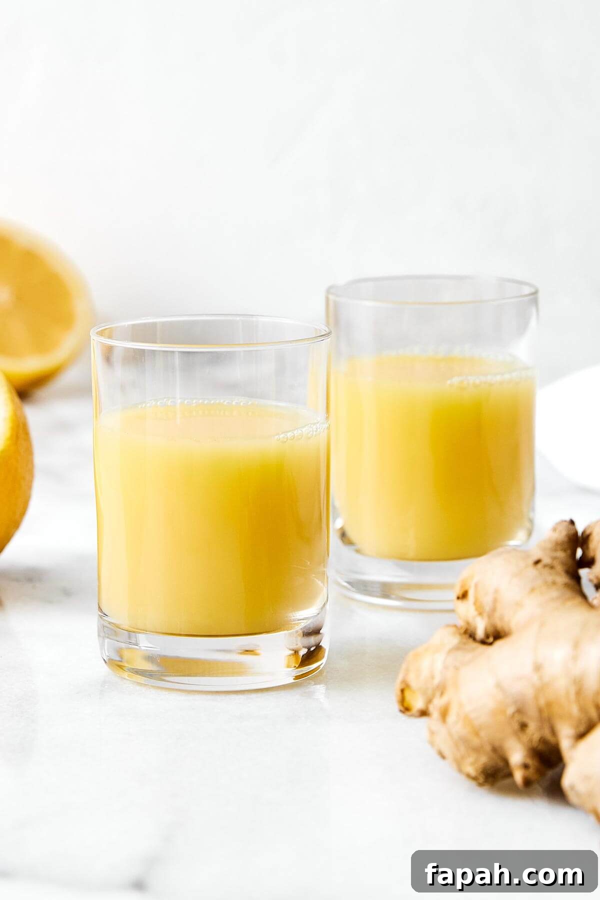 Ginger shots in glass cups.