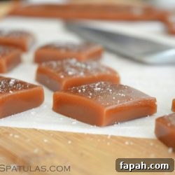 Squares of Sea Salt Caramels on Wooden Board