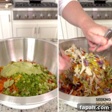 Adding green goddess dressing to the green goddess cabbage salad ingredients and then tossing together in a silver mixing bowl.