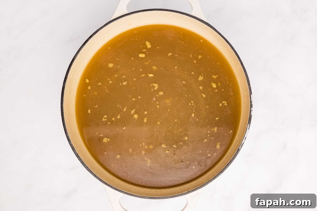 broth warming in pot.