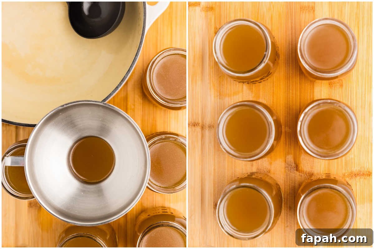 filling jars with chicken bone broth using a funnel and ladle.